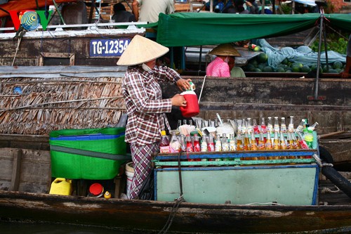 Плавучий рынок «Кайбэ» на юго-западе Вьетнама - ảnh 11