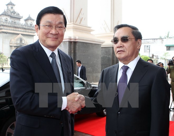 Лаосские СМИ освещают визит президента СРВ Чыонг Тан Шанг в Лаос - ảnh 1