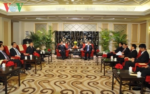 Вице-премьер СРВ Хоанг Чунг Хай встретился с зампредседателя КНР - ảnh 2
