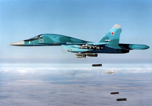 Россия нанесла первые авиаудары по позициям ИГ в Сирии - ảnh 1