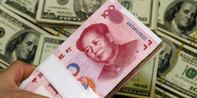 Юань показал максимальный рост к доллару за 10 лет - ảnh 1
