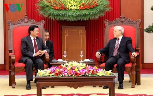 Генсек ЦК КПВ Нгуен Фу Чонг принял высокую делегацию МИД Лаоса - ảnh 1