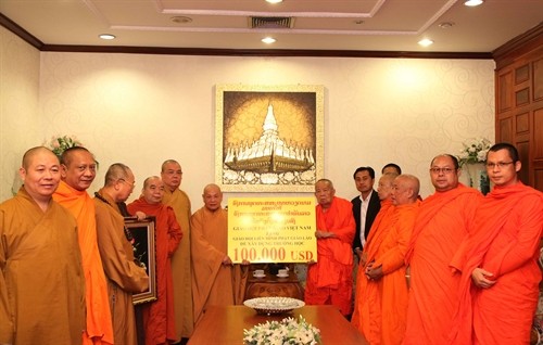 Буддийская сангха Вьетнама и Лаосская буддийская ассоциация активизируют сотрудничество - ảnh 1