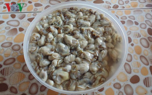 Каша с устрицами – вкусное блюдо провинции Куангбинь - ảnh 3