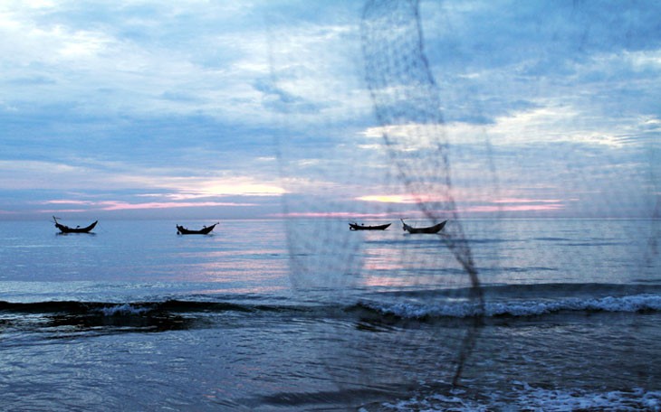 Заря над рыбачьим селом Лангко - ảnh 7