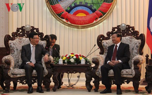 Фам Бинь Минь встретился с премьер-министром и вице-президентом Лаоса - ảnh 1