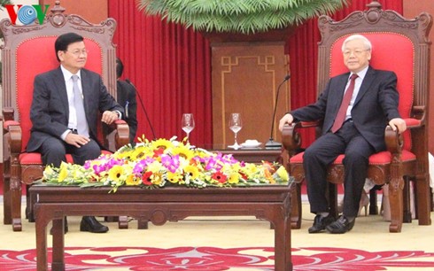 Генеральный секретарь ЦК КПВ принял премьер-министра Лаоса - ảnh 2