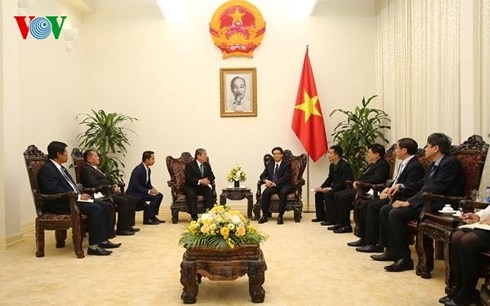 Вице-премьер Вьетнама Ву Дык Дам принял министра информации Камбоджи - ảnh 1