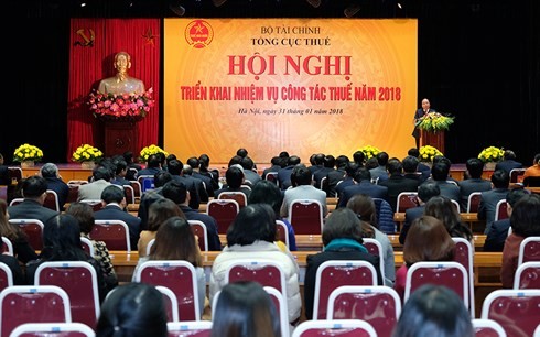 Премьер Вьетнама: налоговая политика должна быть чуткой для привлечения инвестиций - ảnh 1