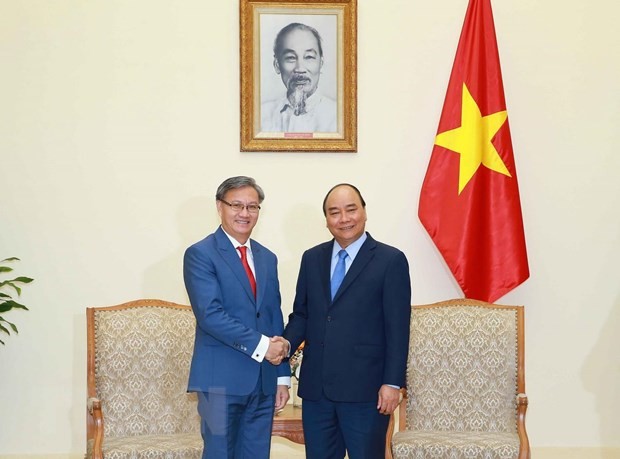 Нгуен Суан Фук принял посла Лаоса в связи с окончанием срока его работы во Вьетнаме - ảnh 1