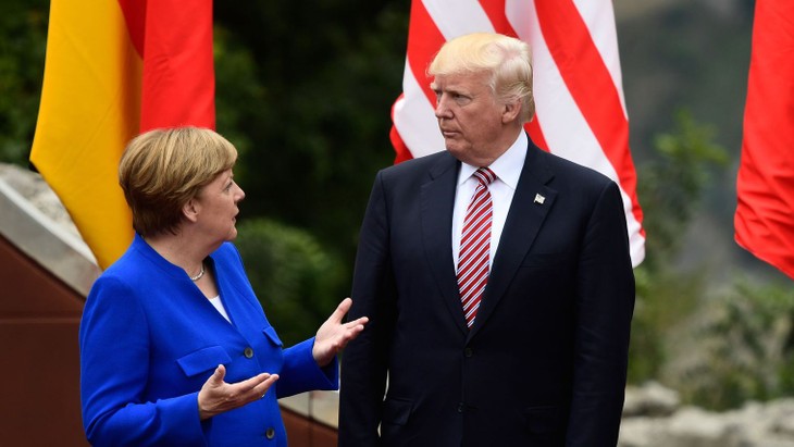 Trump s'entretient avec Merkel et Gentiloni avant le G20 - ảnh 1