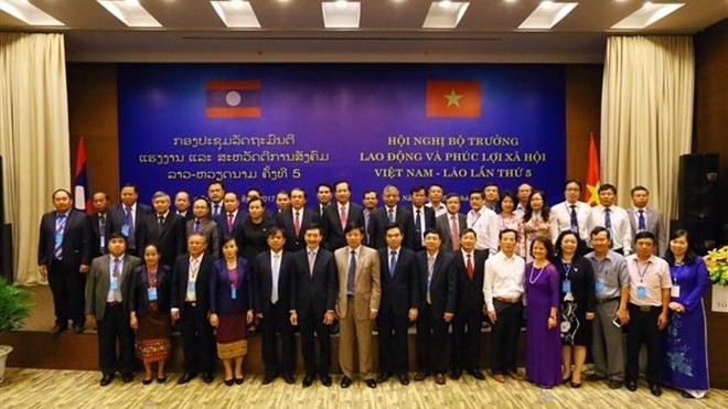 55 ans de relation Vietnam-Laos: en avant la coopération en termes de travail et de société - ảnh 1