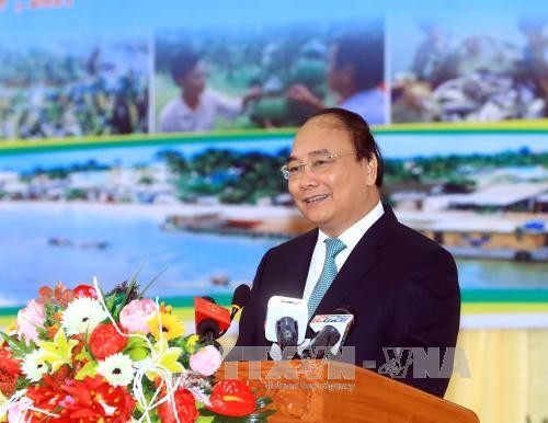 Nguyen Xuan Phuc à une conférence sur la promotion de l’investissement à Hau Giang - ảnh 1