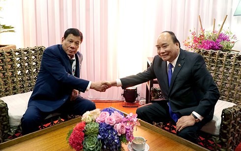  Nguyen Xuan Phuc rencontre le Premier ministre russe et le président philippin - ảnh 2