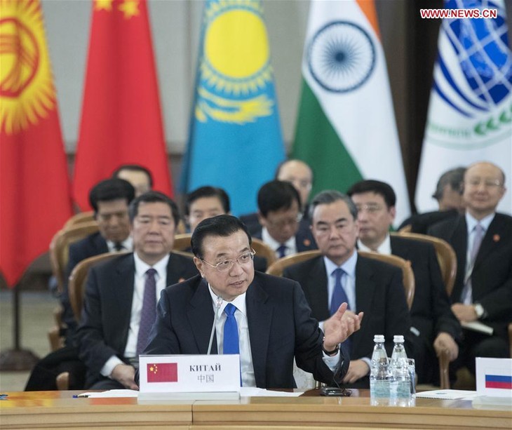 Li Keqiang appelle à renforcer la libéralisation du commerce entre les membres de l'OCS - ảnh 1