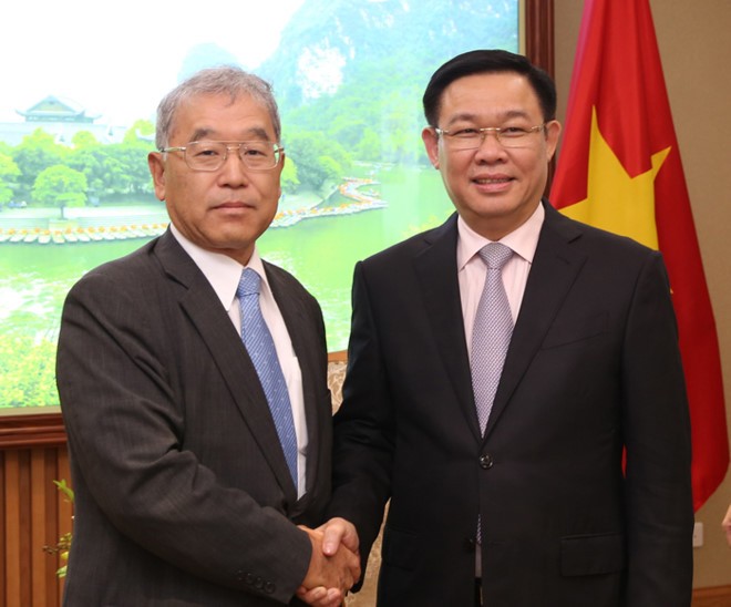 Le vice-président exécutif de Mitsubishi reçu par Vuong Dinh Huê - ảnh 1