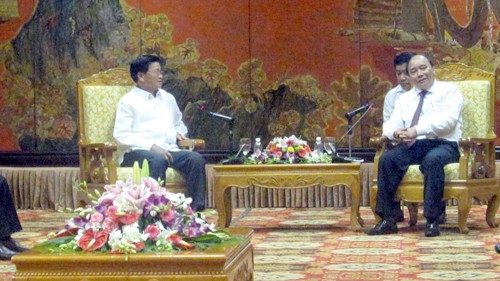 Phó Thủ tướng Nguyễn Xuân Phúc tiếp đoàn đại biểu Lào - ảnh 1