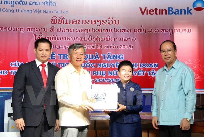 Việt Nam giúp nâng cao năng lực đào tạo nghề cho phụ nữ khuyết tật của Lào - ảnh 1