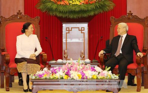 Tổng Bí thư: Việt Nam ủng hộ mạnh mẽ công cuộc đổi mới của Lào - ảnh 2