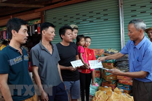 Vỡ đập thủy điện tại Lào: Cộng đồng người Việt Nam chung tay giúp người dân Lào khắc phục sự cố  - ảnh 1