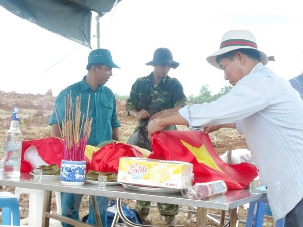 Truy điệu, hồi hương 30 hài cốt liệt sĩ Việt Nam hy sinh tại Lào về nước  - ảnh 1