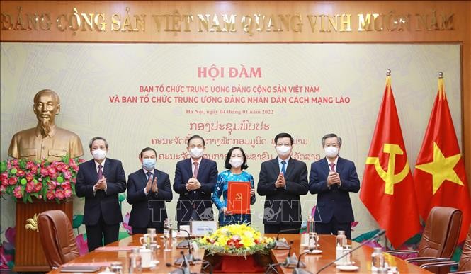 Tăng cường hợp tác giữa hai Ban Tổ chức Trung ương Việt Nam-Lào - ảnh 1