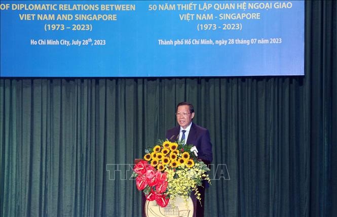 Lễ kỷ niệm 50 năm thiết lập quan hệ ngoại giao Việt Nam - Singapore tại Thành phố Hồ Chí Minh - ảnh 1