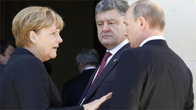 เยอรมนีพยายามแสวงหาทางออกให้แก่การปะทะในยูเครน - ảnh 1