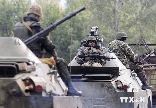 ยูเครนประกาศเงื่อนไขในการถอนทหารออกจากเขตที่เกิดการปะทะ - ảnh 1