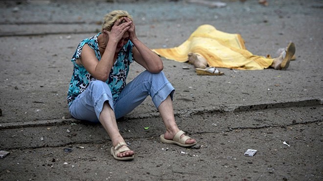 มีผู้เสียชีวิตกว่า 4.000 คนจากการปะทะในภาคตะวันออกของยูเครน - ảnh 1