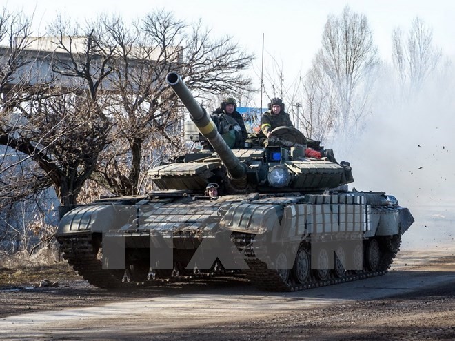กลุ่มนอร์มังดีขยายขอบเขตคำสั่งถอนอาวุธหนักออกจากภาคตะวันออกของยูเครน - ảnh 1