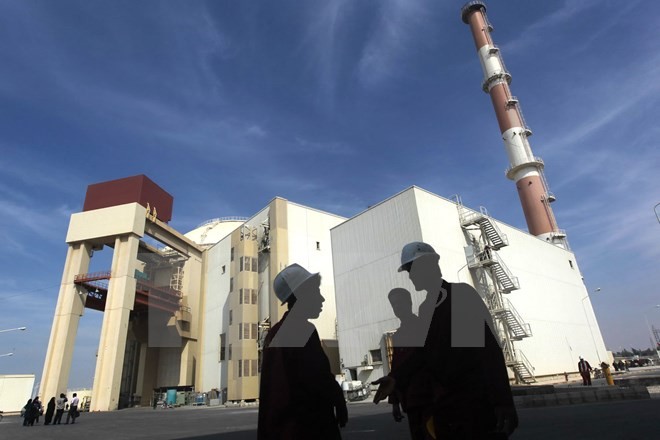 สภาปกครองอิหร่านอนุมัติกฎหมายปกป้องสิทธิการพัฒนานิวเคลียร์ - ảnh 1