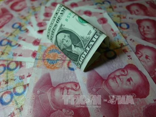 ธนาคารกลางจีนอัดฉีดเงินอีก 1 แสน1หมื่นล้านหยวนเข้าตลาด - ảnh 1