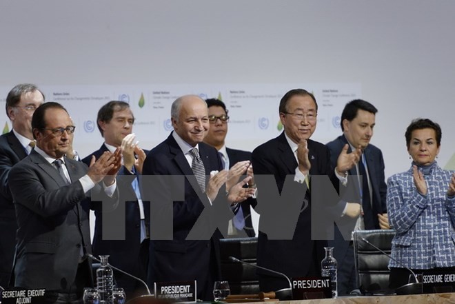 ที่ประชุม COP 21 อนุมัติข้อตกลงรับมือกับการเปลี่ยนแปลงของสภาพภูมิอากาศ - ảnh 1