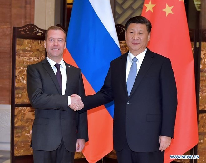 ประธานประเทศจีนสีจิ้นผิงพบปะกับนายกรัฐมนตรีรัสเซีย - ảnh 1