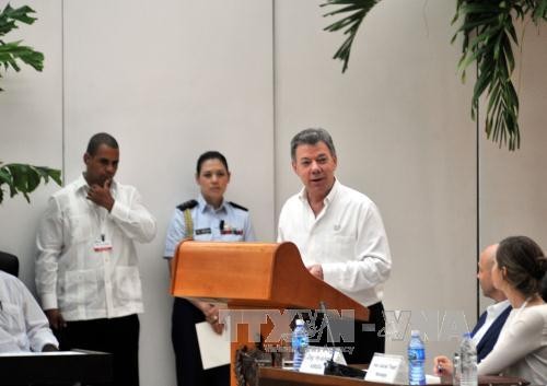รัฐบาลโคลัมเบียและกลุ่ม FARC ลงนามในข้อตกลงหยุดยิง - ảnh 1