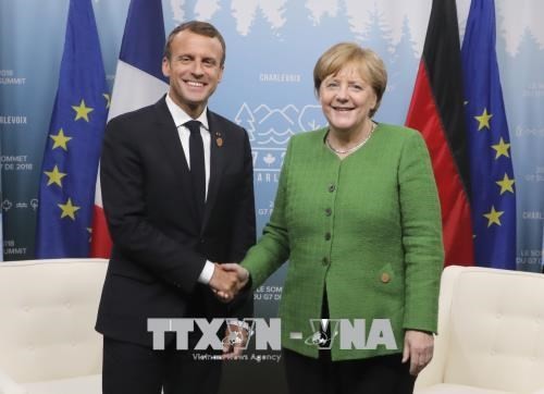 เยอรมนีและฝรั่งเศสอยากปรับปรุงโครงสร้างหนี้ของเขตยูโรโซน - ảnh 1