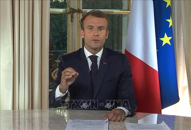 ประธานาธิบดีฝรั่งเศสประณามเหตุรุนแรงของกลุ่มเสื้อกั๊กเหลือง - ảnh 1