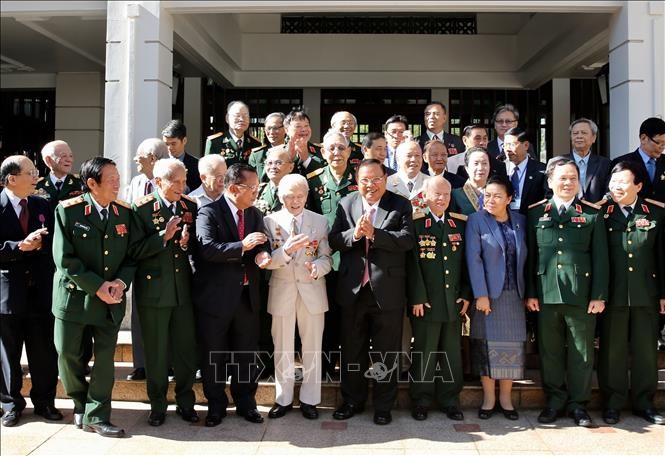 จดหมายแสดงความยินดีในโอกาสรำลึกครบรอบ 70ปีวันทหารอาสาและผู้เชี่ยวชาญเวียดนามในประเทศลาว - ảnh 1