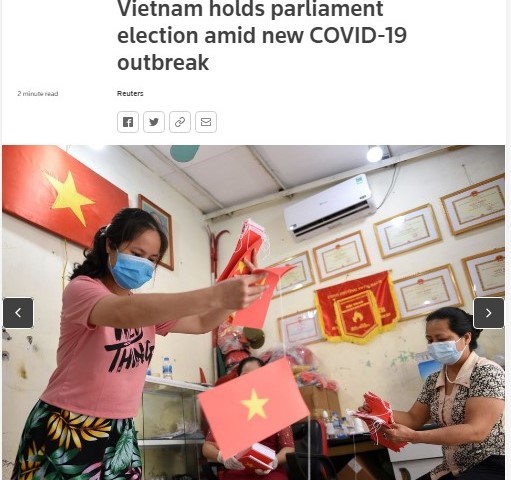 สื่อต่างชาติรายงานว่า การเลือกตั้งทั่วไปในเวียดนามดำเนินไปอย่างปลอดภัย - ảnh 1