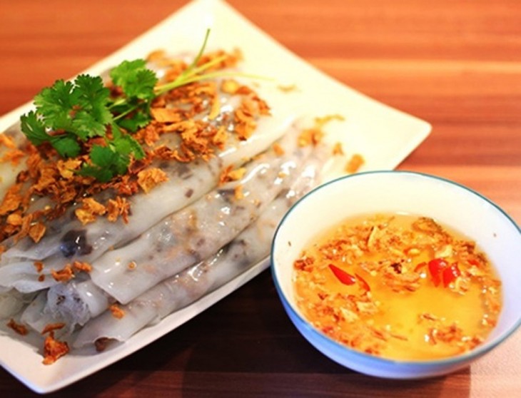 แบ๊งก๊วน หรือ ข้าวเกรียบปากหม้อของเวียดนามติดหนึ่งในเมนูอาหารที่อร่อยที่สุดในโลกปี 2023 - ảnh 1